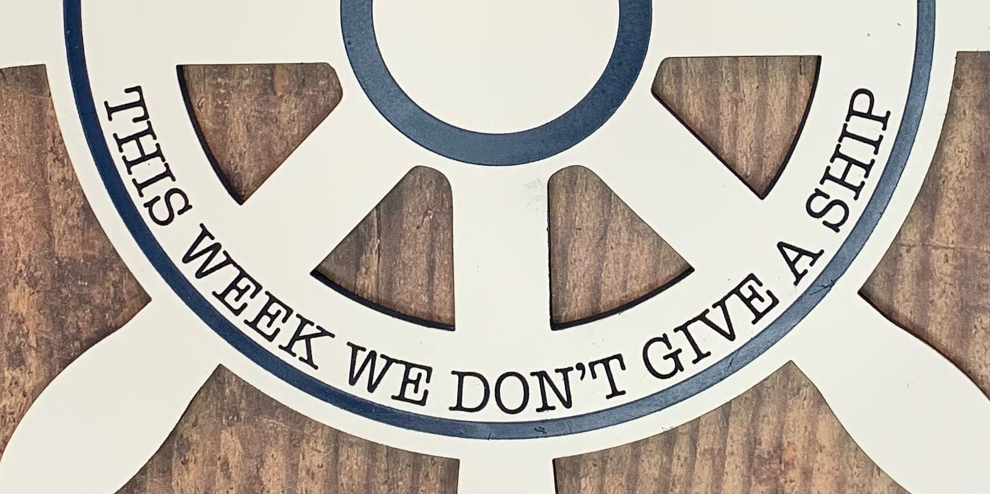 Decorative sign with 'This week we don't give a ship'